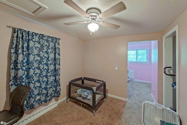 296 S Saginaw St, Montrose, MI 48457 - bedroom with carpet flooring, a baseboard heating unit, and ceiling fan