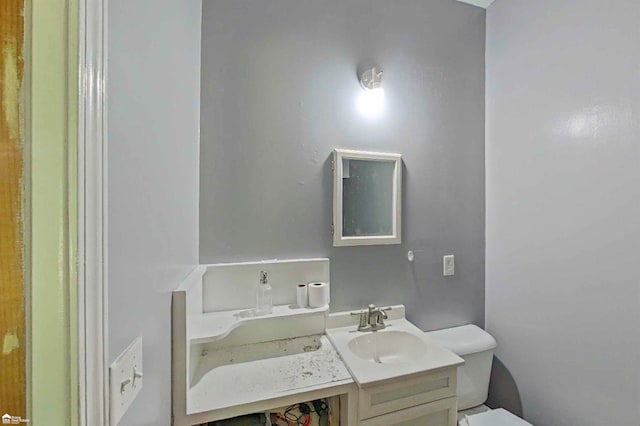 296 S Saginaw St, Montrose, MI 48457 - half bathroom featuring vanity and toilet