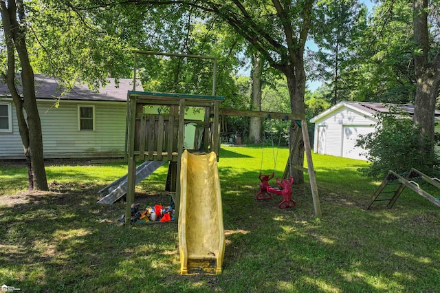 296 S Saginaw St, Montrose, MI 48457 - view of play area featuring a yard and an outbuilding