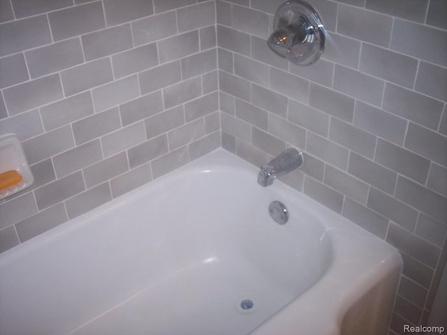 20003 Lichfield Rd, Detroit, MI 48221 - full bathroom featuring a bathtub and a shower