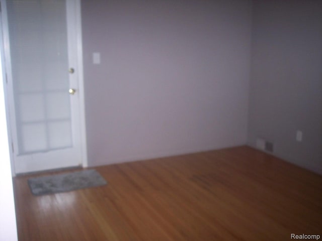 20003 Lichfield Rd, Detroit, MI 48221 - empty room featuring wood finished floors