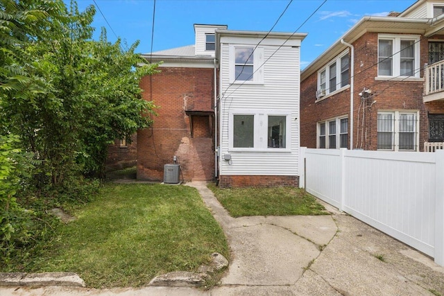2475 Hazelwood St, Detroit, MI 48206 - view of home's exterior with a central AC unit