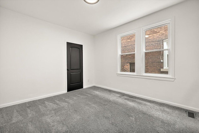 2475 Hazelwood St, Detroit, MI 48206 - unfurnished room featuring carpet floors and baseboards