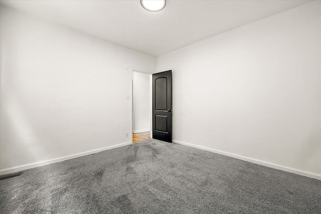 2475 Hazelwood St, Detroit, MI 48206 - unfurnished room featuring carpet and baseboards