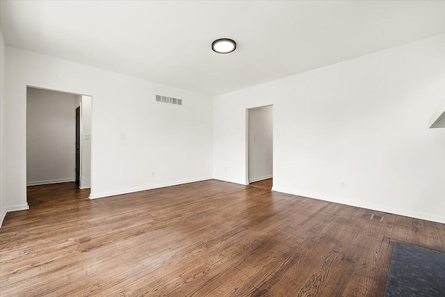 2475 Hazelwood St, Detroit, MI 48206 - spare room featuring wood finished floors and baseboards