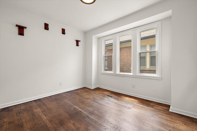 2475 Hazelwood St, Detroit, MI 48206 - empty room with dark wood-style floors