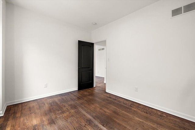 2475 Hazelwood St, Detroit, MI 48206 - unfurnished room featuring baseboards and dark wood-type flooring