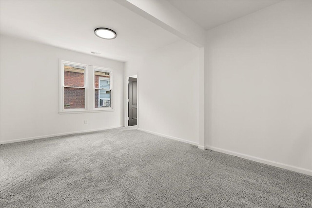 2475 Hazelwood St, Detroit, MI 48206 - spare room featuring carpet and baseboards