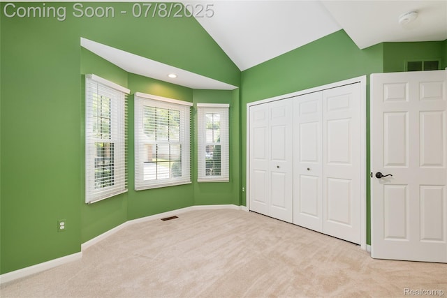 57349 Megan Dr, Washington, MI 48094 - unfurnished bedroom featuring carpet floors, lofted ceiling, and a closet