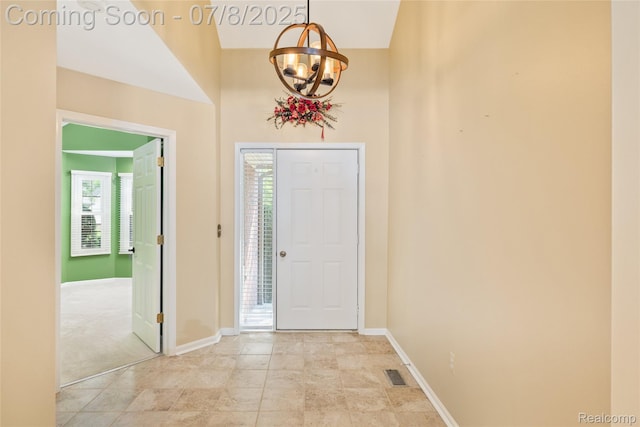 57349 Megan Dr, Washington, MI 48094 - foyer entrance with a chandelier and a high ceiling