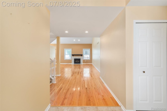 57349 Megan Dr, Washington, MI 48094 - hallway with stairway, recessed lighting, and wood finished floors