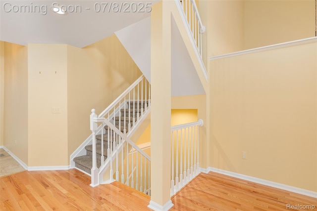 57349 Megan Dr, Washington, MI 48094 - staircase featuring wood finished floors