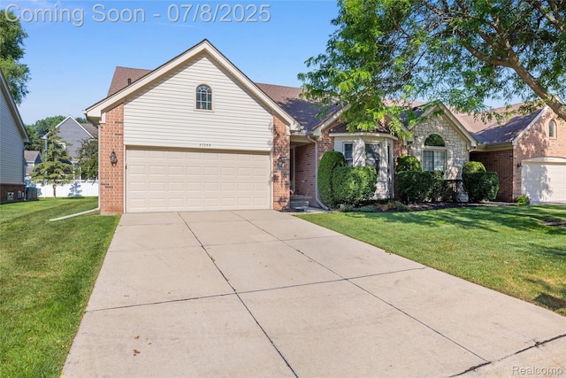 57349 Megan Dr, Washington, MI 48094 - traditional-style home featuring brick siding, driveway, and a front lawn