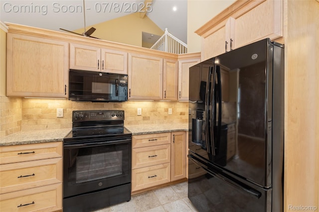 57349 Megan Dr, Washington, MI 48094 - kitchen with black appliances, light brown cabinets, decorative backsplash, light stone counters, and high vaulted ceiling