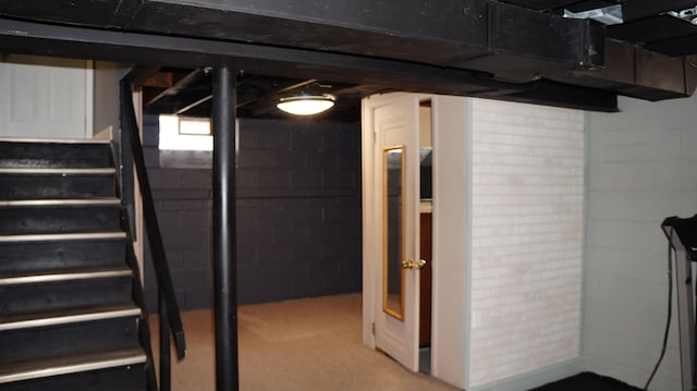 13558 Asbury Park, Detroit, MI 48227 - below grade area featuring stairs, carpet flooring, and concrete block wall