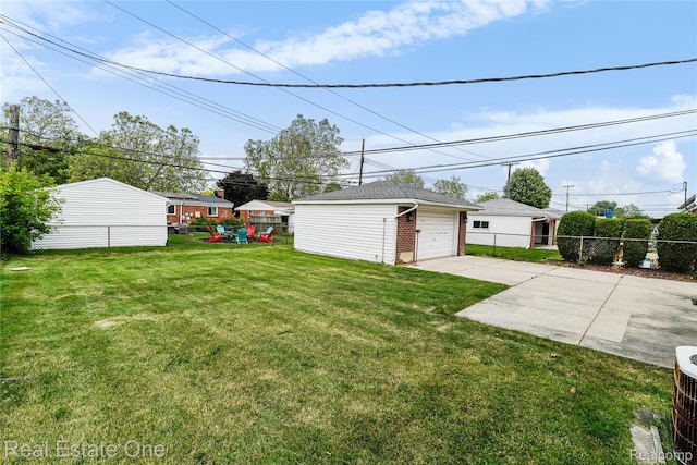 13776 Leroy St, Southgate, MI 48195 - view of yard featuring an outdoor structure and a garage