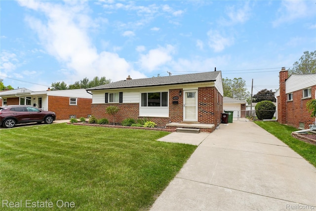 13776 Leroy St, Southgate, MI 48195 - view of front of property with brick siding, a front lawn, and a detached garage
