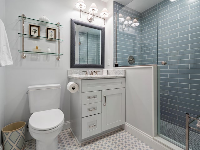 111 N Ashley St Unit 513, Ann Arbor, MI 48104 - full bathroom featuring tile patterned floors, a walk in shower, and vanity