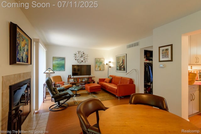 2746 Page Ave, Ann Arbor, MI 48104 - living room featuring a fireplace and light wood-type flooring