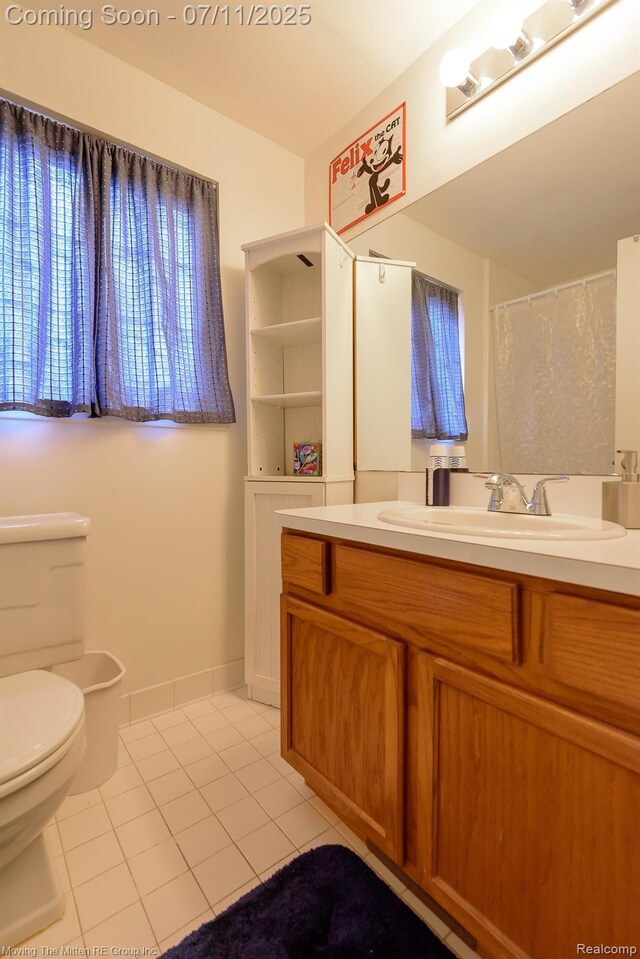2746 Page Ave, Ann Arbor, MI 48104 - bathroom with tile patterned flooring and vanity