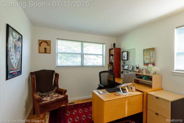 2746 Page Ave, Ann Arbor, MI 48104 - home office featuring baseboards and wood finished floors