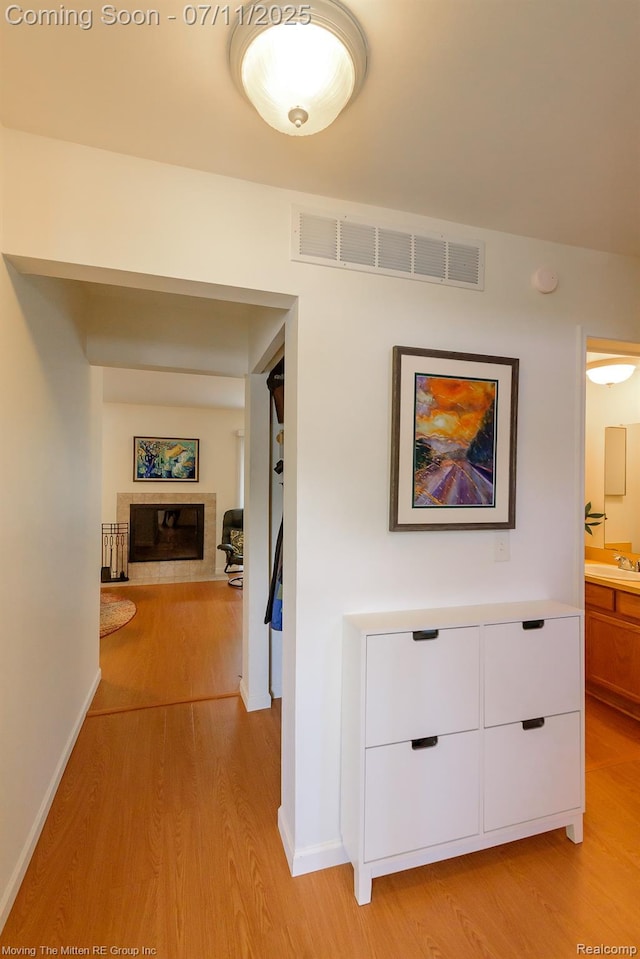 2746 Page Ave, Ann Arbor, MI 48104 - hall with light wood-style flooring and a sink