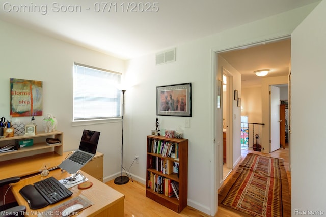 2746 Page Ave, Ann Arbor, MI 48104 - home office featuring light wood-type flooring and baseboards