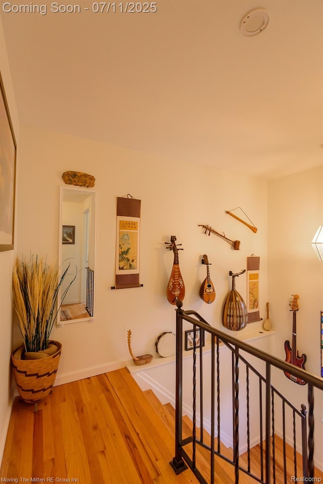 2746 Page Ave, Ann Arbor, MI 48104 - corridor featuring wood finished floors and baseboards