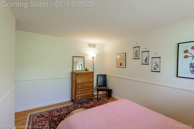 2746 Page Ave, Ann Arbor, MI 48104 - bedroom featuring wood finished floors and baseboards