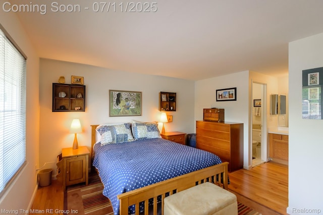 2746 Page Ave, Ann Arbor, MI 48104 - bedroom with wood finished floors and connected bathroom