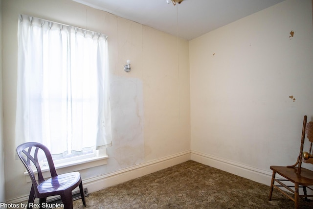 892 W Forest Ave, Muskegon, MI 49441 - unfurnished room with carpet and baseboards