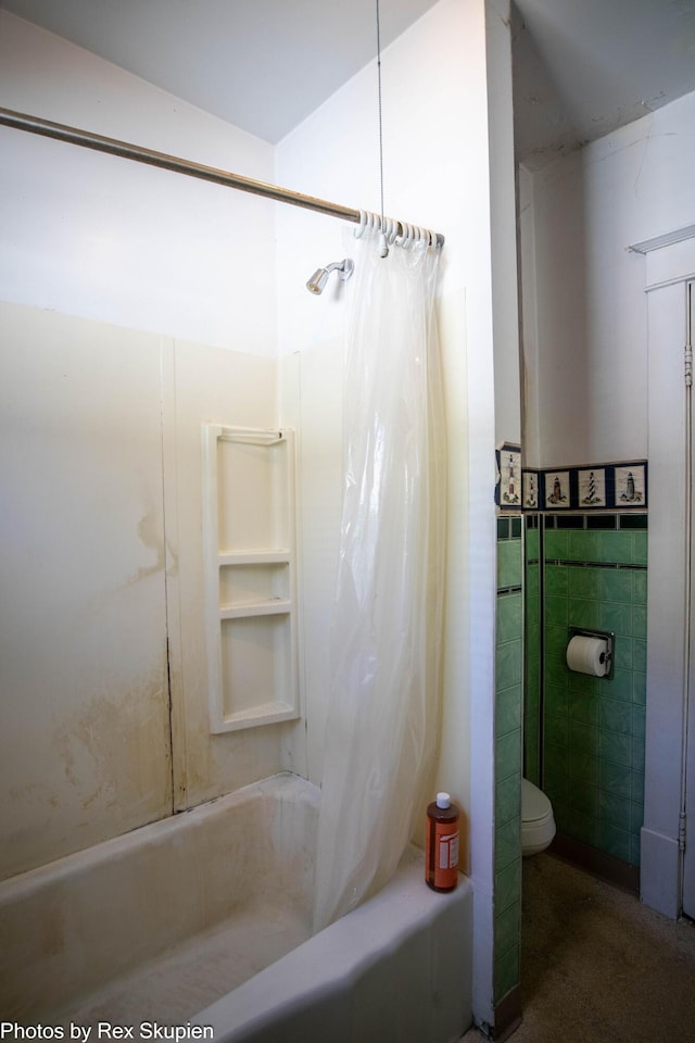 892 W Forest Ave, Muskegon, MI 49441 - full bathroom with shower / bath combo with shower curtain and tile walls