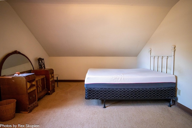 892 W Forest Ave, Muskegon, MI 49441 - bedroom featuring carpet flooring and vaulted ceiling