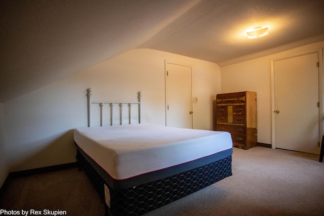 892 W Forest Ave, Muskegon, MI 49441 - carpeted bedroom with vaulted ceiling