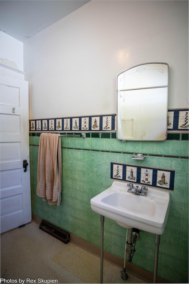 892 W Forest Ave, Muskegon, MI 49441 - bathroom with tile walls and a wainscoted wall
