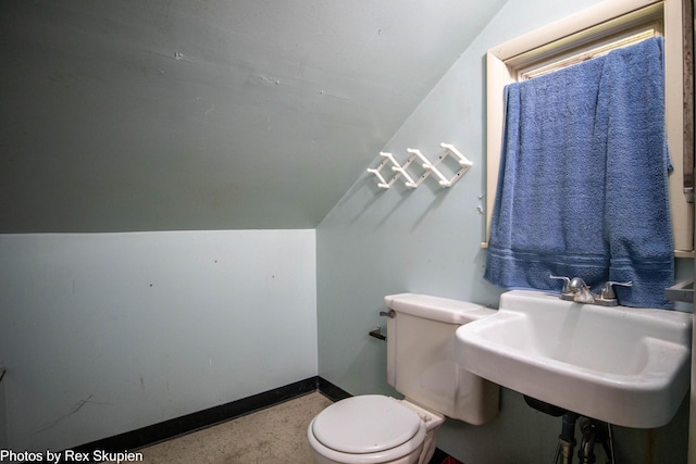 892 W Forest Ave, Muskegon, MI 49441 - half bathroom with toilet and vaulted ceiling