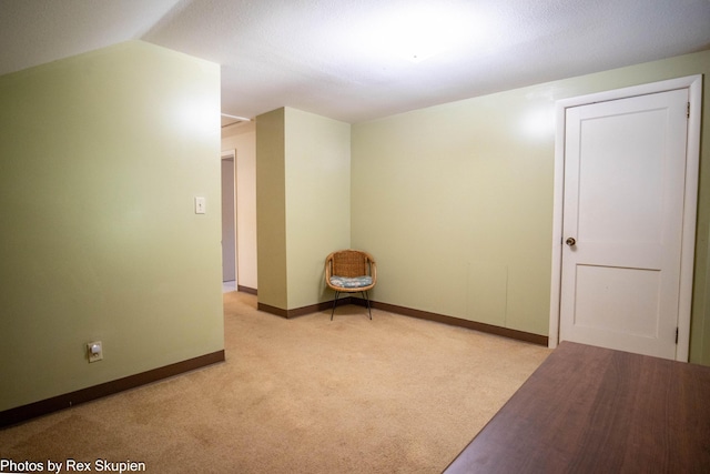 892 W Forest Ave, Muskegon, MI 49441 - unfurnished room featuring light colored carpet