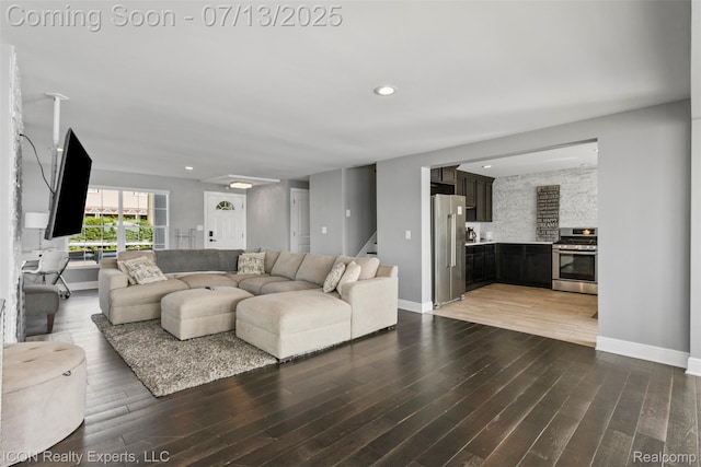106 St Clair River Dr, Algonac, MI 48001 - living area featuring wood finished floors, recessed lighting, and stairs