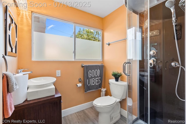 106 St Clair River Dr, Algonac, MI 48001 - full bath featuring vanity, a stall shower, and wood finished floors