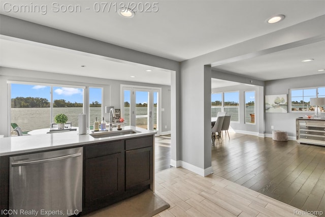 106 St Clair River Dr, Algonac, MI 48001 - kitchen with dishwasher, open floor plan, light countertops, recessed lighting, and light wood-style floors