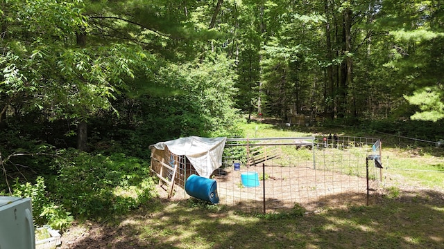 17644 Stronach Dam Rd, Wellston, MI 49689 - view of yard featuring a wooded view