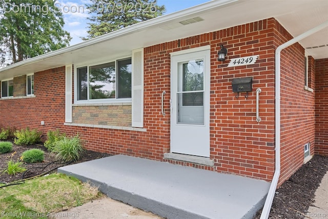44249 Donley Dr, Sterling Heights, MI 48314 - entrance to property with brick siding