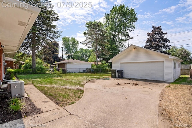 44249 Donley Dr, Sterling Heights, MI 48314 - view of yard with a detached garage and an outdoor structure