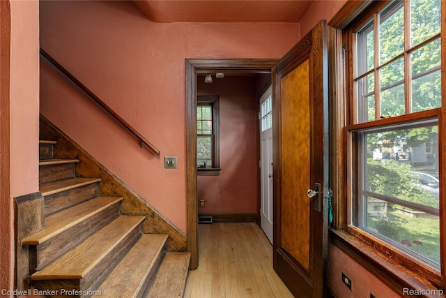 122 Linden Ct, Ypsilanti, MI 48197 - stairway with wood-type flooring and a textured wall