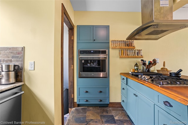122 Linden Ct, Ypsilanti, MI 48197 - kitchen with island range hood, appliances with stainless steel finishes, butcher block counters, and blue cabinets