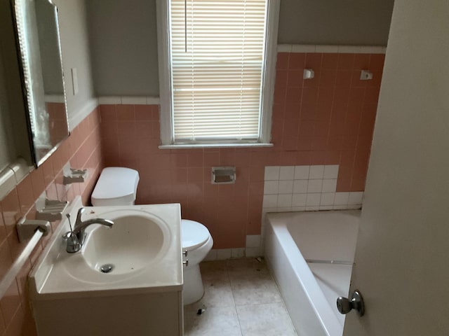 8518 Sussex St, Detroit, MI 48228 - full bath with tile walls, a bath, tile patterned flooring, vanity, and a wainscoted wall