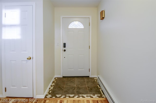 11247 Irish Rd, Otisville, MI 48463 - doorway to outside with baseboard heating and tile patterned floors