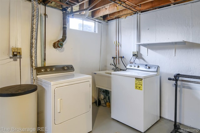 11247 Irish Rd, Otisville, MI 48463 - laundry room with washer and clothes dryer