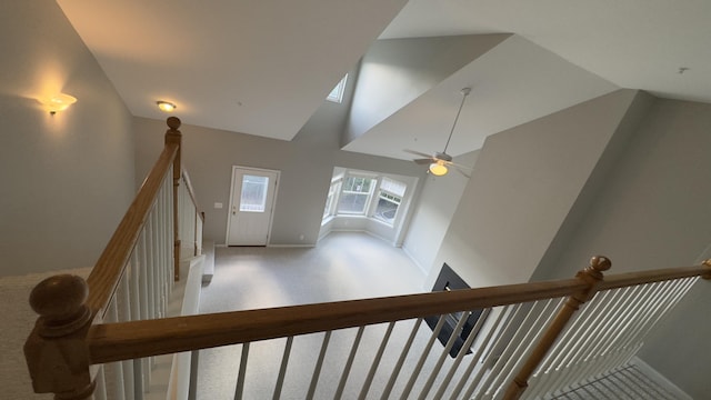 41664 Tera Ln, Novi, MI 48375 - staircase featuring high vaulted ceiling, carpet, and ceiling fan