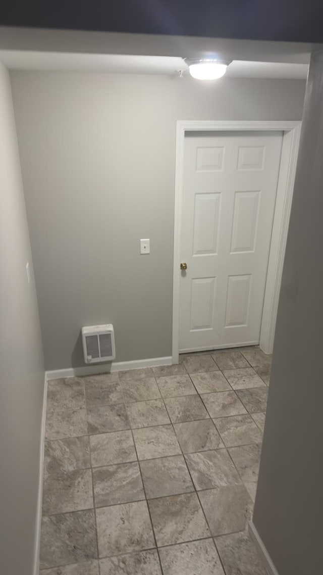 41664 Tera Ln, Novi, MI 48375 - laundry room with baseboards and tile patterned flooring